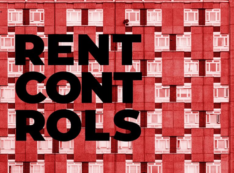 Windows of a high-rise block, behind bold text saying 'rent controls'