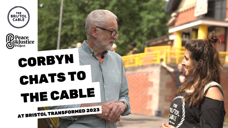 Imagine of former Labour leader Jeremy Corbyn talking to Bristol Cable reporter Priyanka Raval