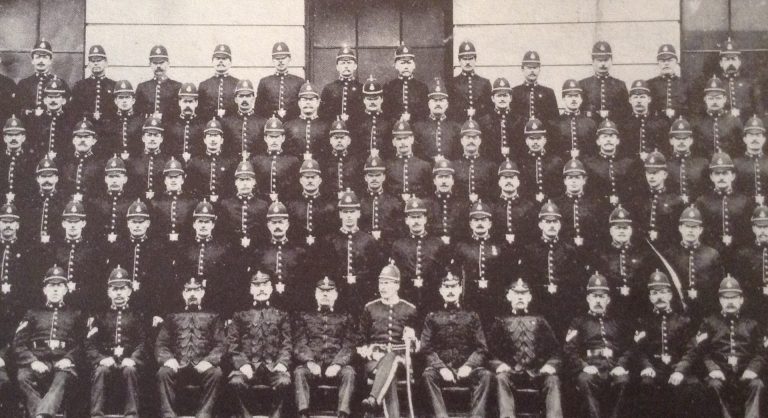 Image of former Bristol police chief John Henderson Watson surrounded by his constables
