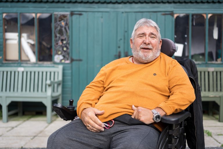Image of Kevin Baker, who was left paralysed on one side in 2004, says money struggles mean he is less able to use support services, taken at Paul's Place in Coalpit Heath (credit: David Griffiths)