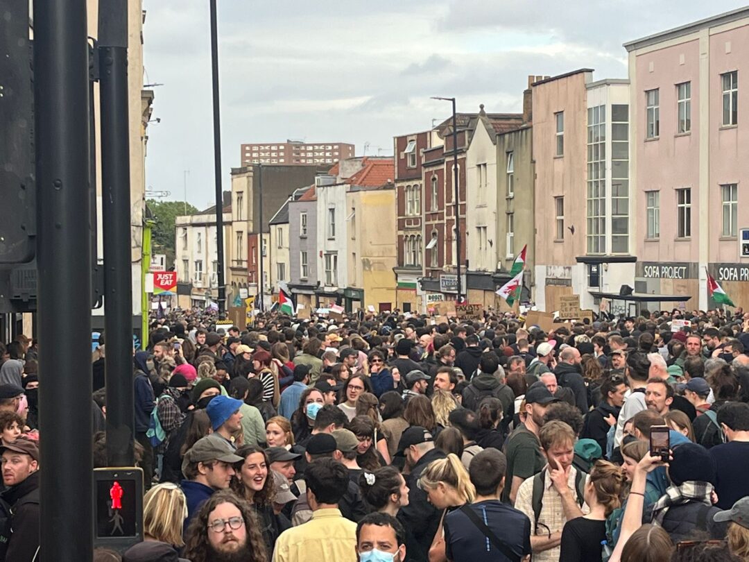 A huge crowd of protesters fill the street in Old Market