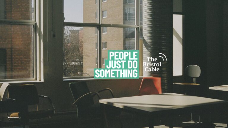 An empty school classroom with desks and chairs. Overlayed is the 'People Just Do Something' logo.